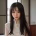 媒体研究专家李晓媛女士头像，短发职业装，背景为办公室书架